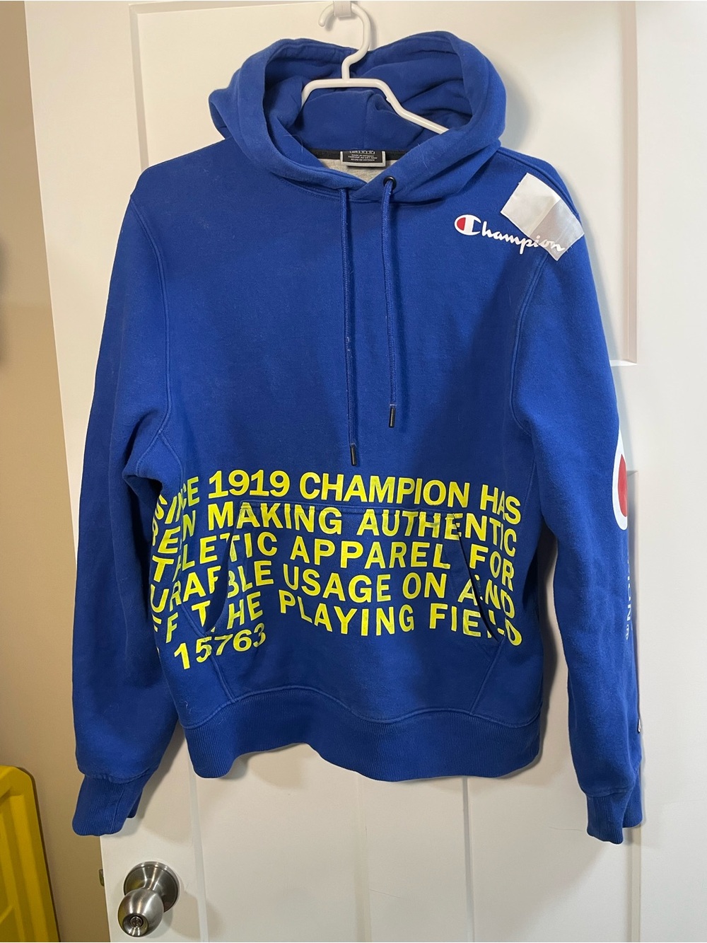 Champion Royal Blue Hoodie with Yellow Text Graphic